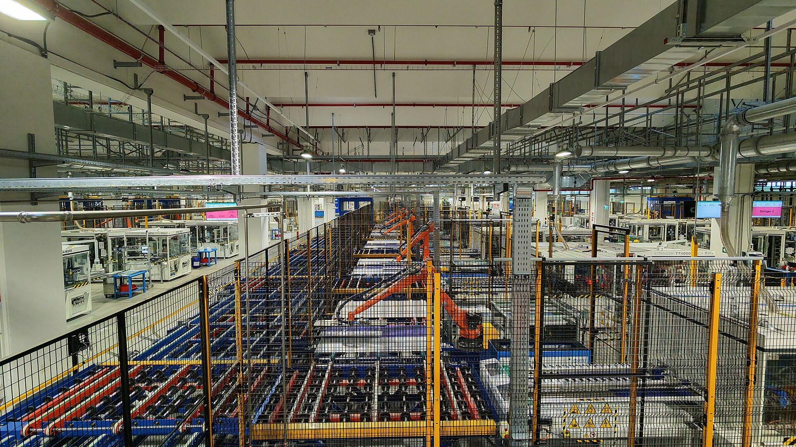 A robot work cell on an automated production line